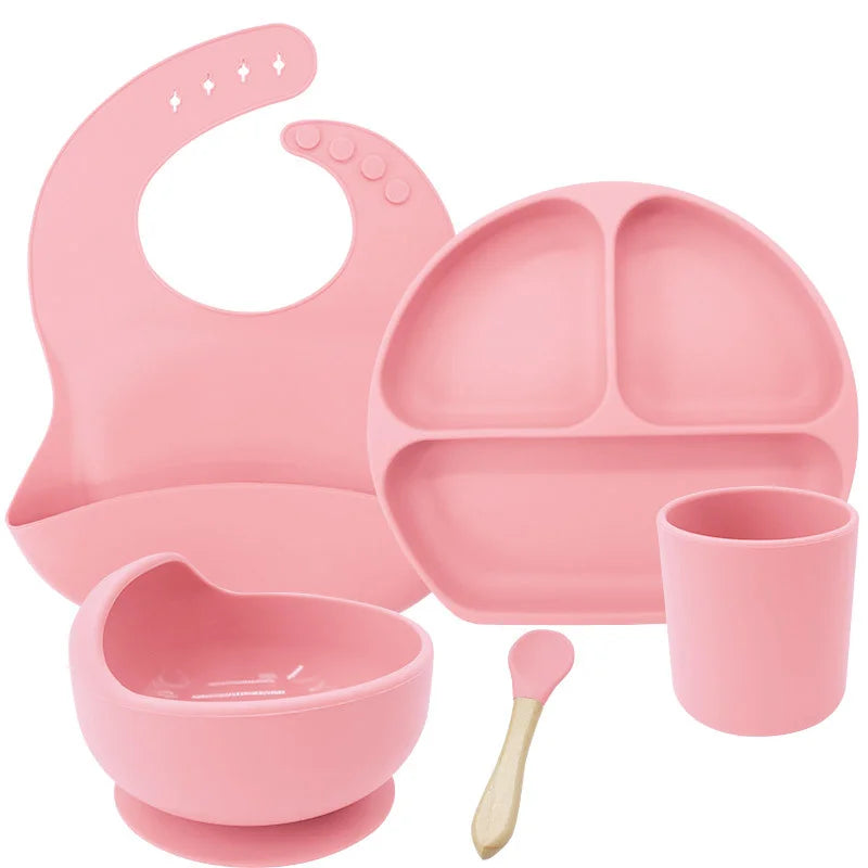 Light pink 5-piece silicone bibs and feeding set