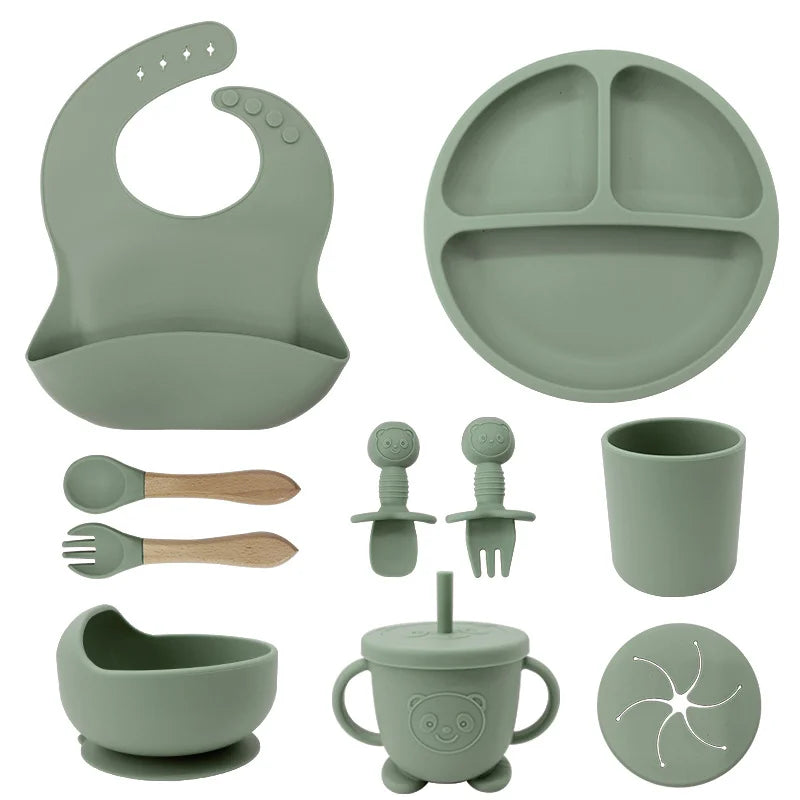 Green 10-piece silicone bibs and feeding set for infants