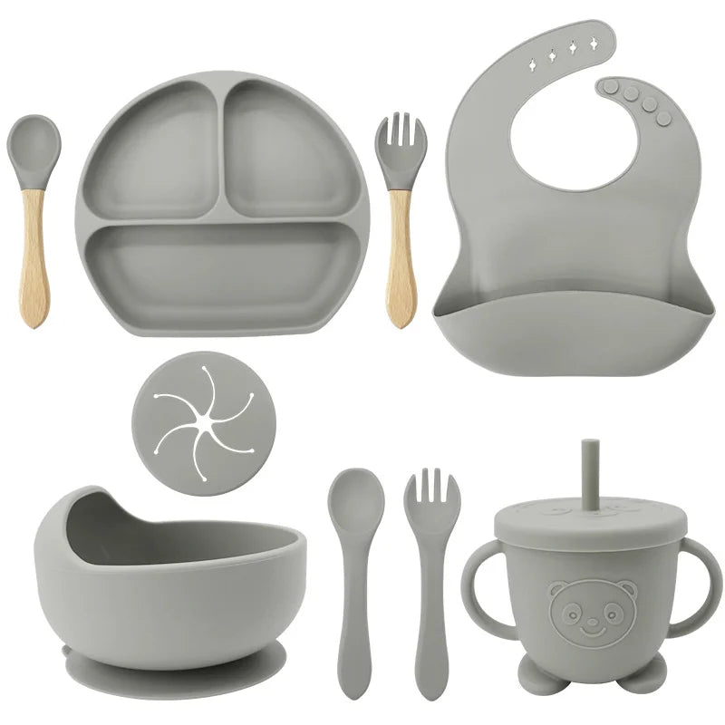 Silver 9-piece silicone bibs and feeding set.