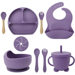 Purple 9-piece silicone bibs and feeding set.